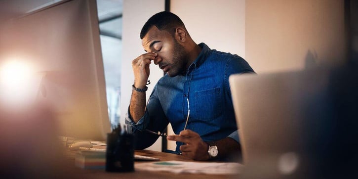 An employee stressed from work. 