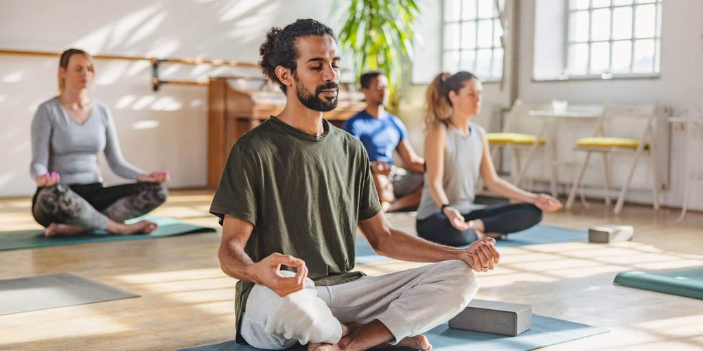 people taking a meditation course