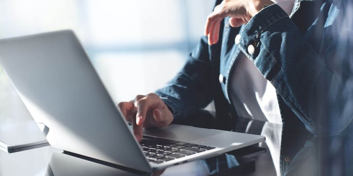 Patient watching on-demand videos on laptop