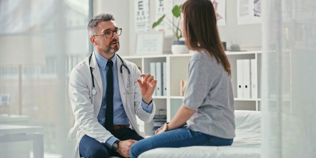 doctor talking to patient